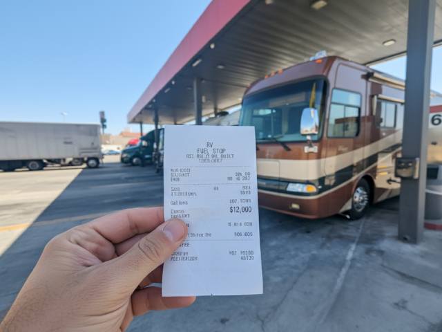 Person calculating RV fuel costs